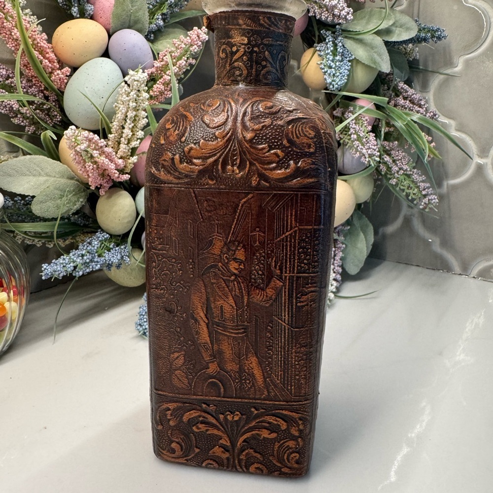 Vintage Miguel De Cervantes leather embossed decanter